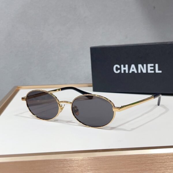 Chanel Oval Sunglasses Gold Metal Frame Black Lens