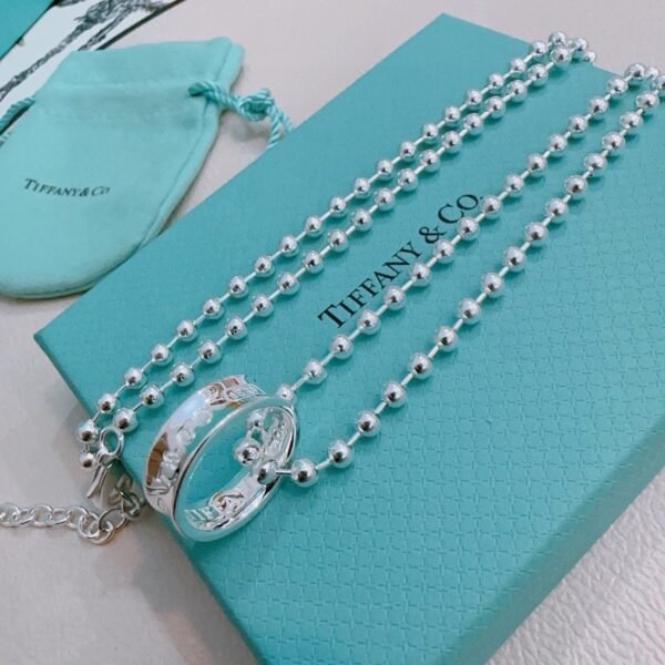 Tiffany & Co. Silver Engraved Ring Charm Ball Chain Necklace